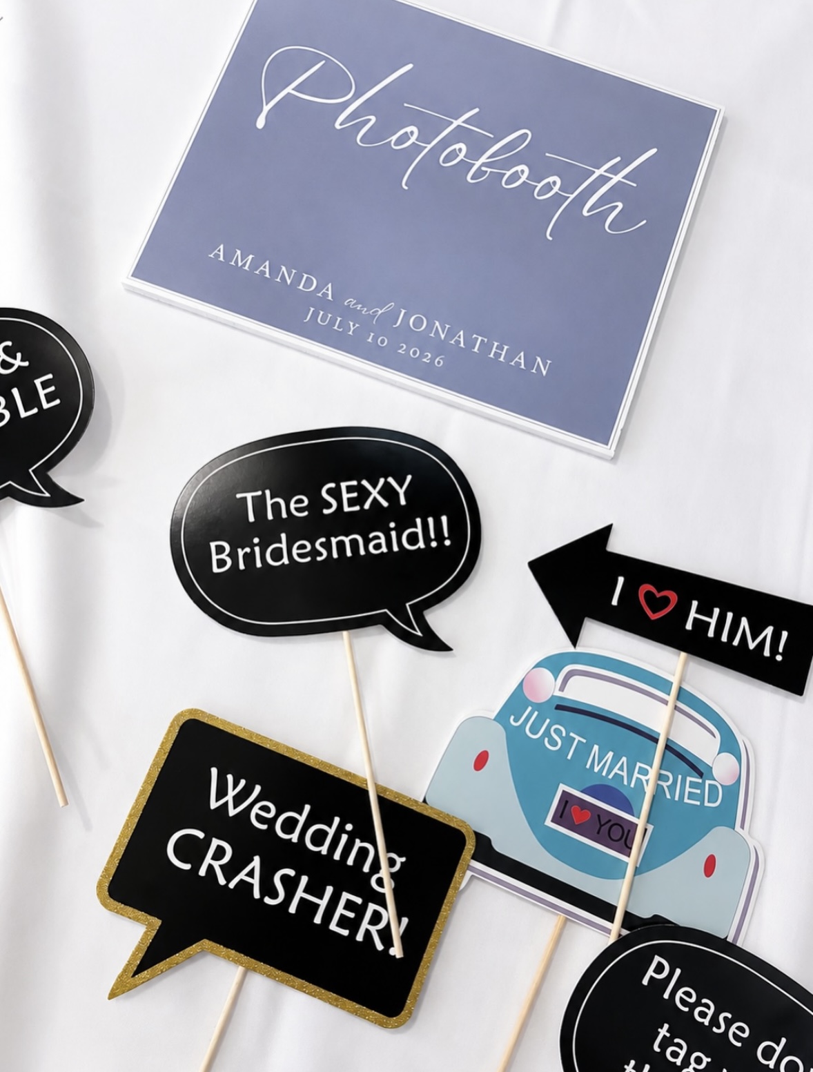Personalised photobooth welcome design and a selection of playful photo props